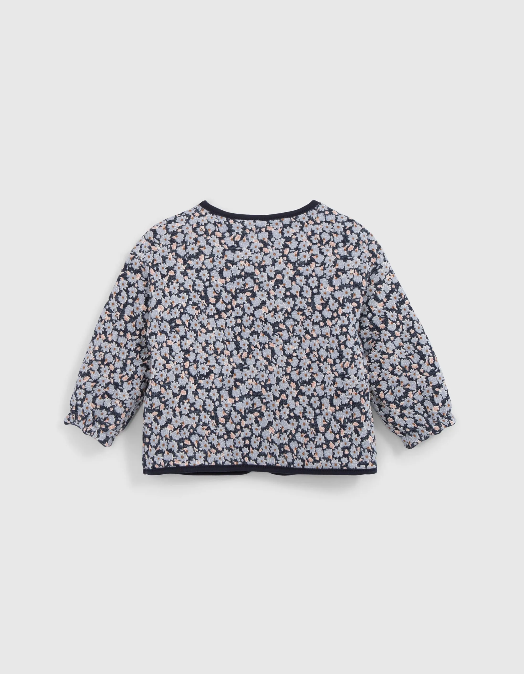 Cardigan réversible marine et fleurs bébé fille